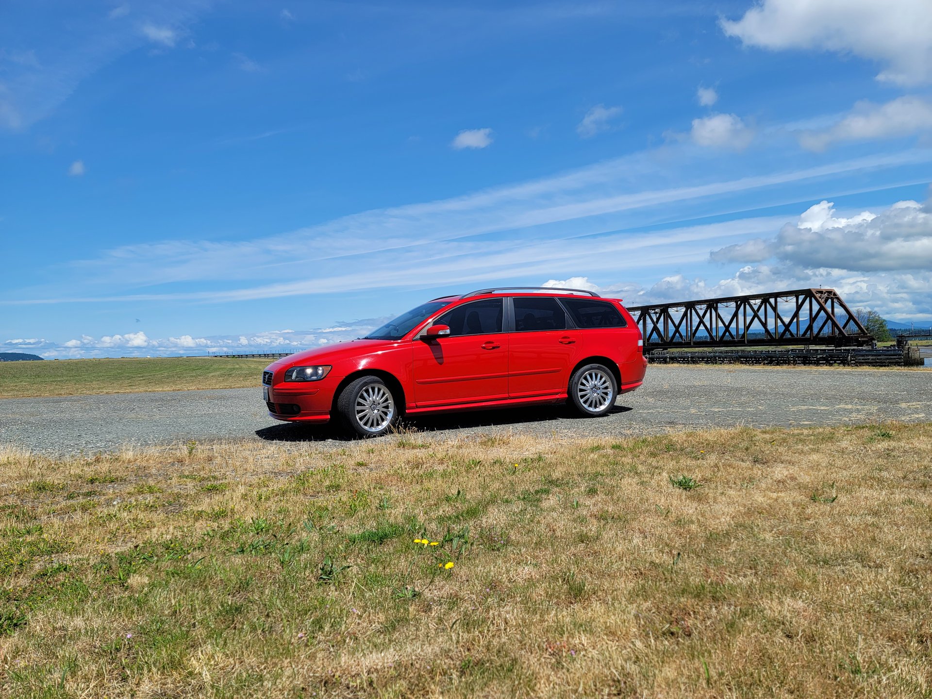 Volvo V50 wagon serviced by Roamadic Mechanic, parked near the water on San Juan Island
